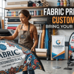 Woman operating large dye-sublimation textile printer making custom flags and banners with vibrant logos in professional print shop setting.
